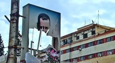 تمزيق صور بشار الأسد في محيط دمشق